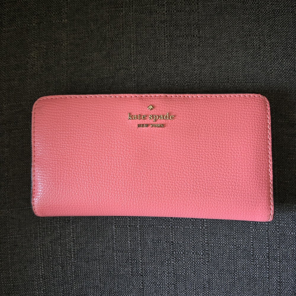 kate spade pink zip-around pebbled leather wallet with gold logo